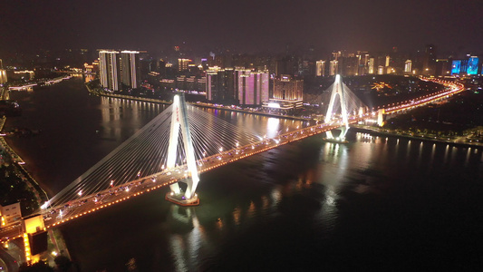 航拍海南海口海甸河世纪大桥夜景灯光秀视频