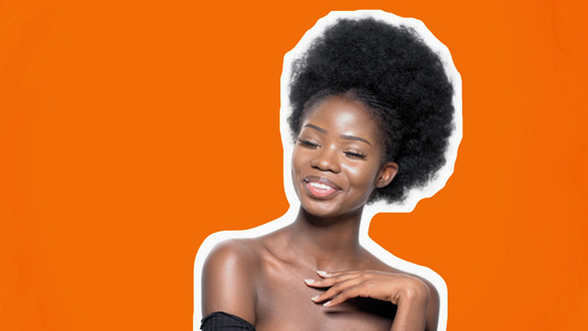 以多彩橙色背景微笑的非洲女人欢欣快乐视频