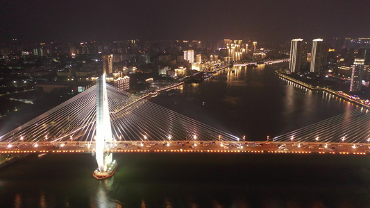 航拍海南海口海甸河世纪大桥夜景灯光秀视频