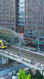 多角度航拍穿梭在城市间的地铁轻轨素材合集视频