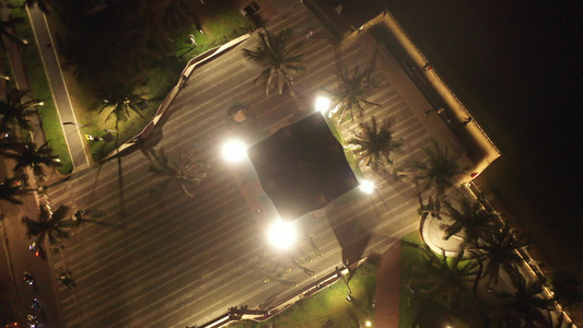 航拍海南海口海甸河畔的海口钟楼夜景灯光秀视频