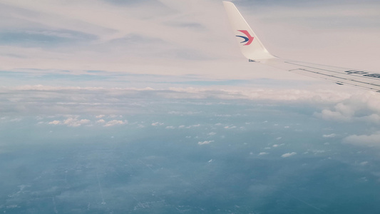 4K航拍飞机高空视角云层和窗外自然风光视频