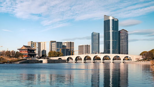 北京通州京杭大运河大光楼七孔桥城市建设延时云蓝天湖面河水城市副中心反射倒影环境建设建筑地标古桥古建筑视频