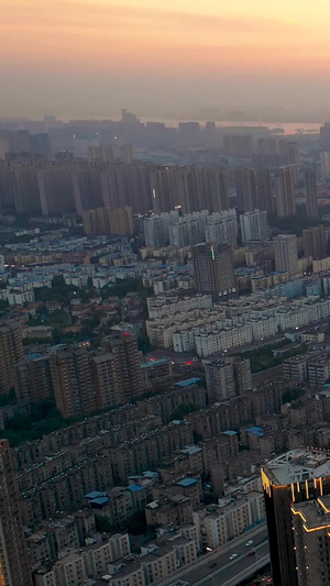 航拍晚霞之下的武汉武昌主城区都市风光高楼大厦21秒视频