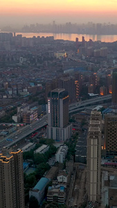 航拍晚霞之下的武汉武昌主城区都市风光高楼大厦视频