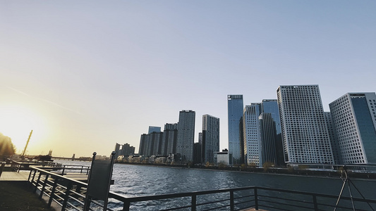 北京通州京杭大运河建筑群城市建设日出朝霞延时火烧云倒影水面湖面河面夜转日写字楼高层住宅视频