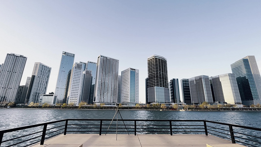 北京通州京杭大运河建筑群城市建设日出朝霞延时火烧云倒影水面湖面河面夜转日写字楼高层住宅视频