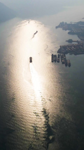 航拍逆光下万里长江波光粼粼大气震撼长江三峡工业风视频