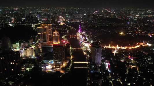 航拍广东中山岐江河兴中广场幻彩摩天轮夜景视频