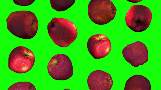 绿色背景上的红美味苹果翻滚01a视频