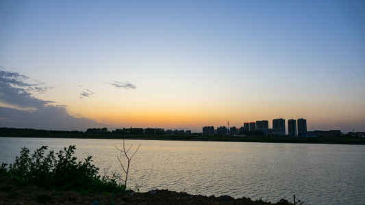 延时摄影 湖边日落 日转夜西黑 堆河堤视频