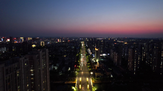 山东潍坊城市晚霞夜幕降临夜景灯光交通航拍视频