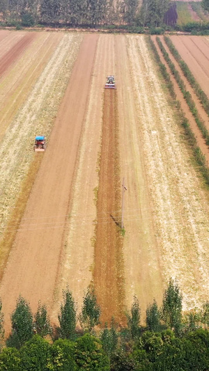 陕西农业拖拉机耕地作业航拍素材农产品76秒视频