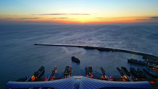 海南海口新海客运枢纽港口高视角航拍夜晚蓝调夜景视频