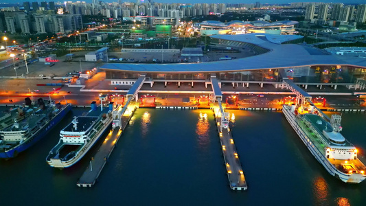 海南海口新海客运枢纽港口高视角航拍夜晚蓝调夜景视频