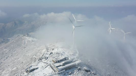 浙江东阳东白山风车云海雪景航拍延时视频