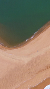 海南琼海博鳌玉带滩沙滩地标航拍旋转缓缓上升天涯海角视频