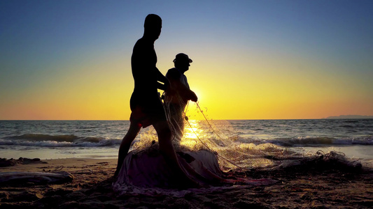 日落海滩电影制片人Standicam拍摄到的捕渔网视频