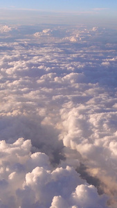 万米高空云层之上俯瞰云海景观仙境的幻觉自然世界天空素材天空空镜视频