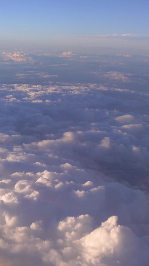 万米高空云层之上俯瞰云海景观仙境的幻觉自然世界天空素材天空空镜34秒视频