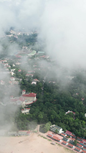 航拍青岛滨海旅游度假区云海中的青岛八大关视频