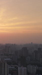 航拍城市风光日落夕阳晚霞天空城市全景素材写字楼视频