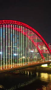 近距离环绕航拍城市桥梁武汉晴川桥道路夜景灯光车流交通素材桥梁素材视频