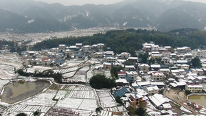 4K航拍农村居民房冬季雪景23秒视频