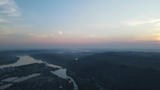 航拍丘陵大山日落晚霞自然风光视频