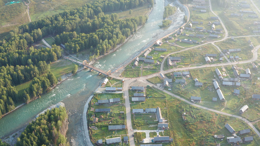 4K航拍新疆旅游风景禾木村落河流视频