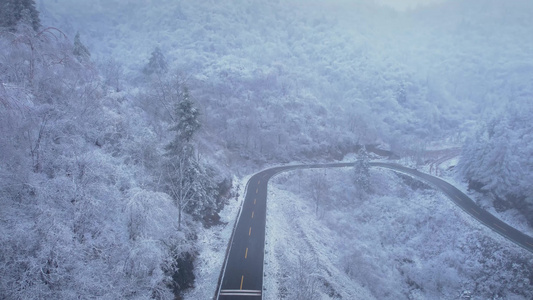 4K冬天雪山道路航拍视频视频