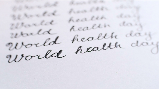 钢笔字书写世界卫生日的英语视频