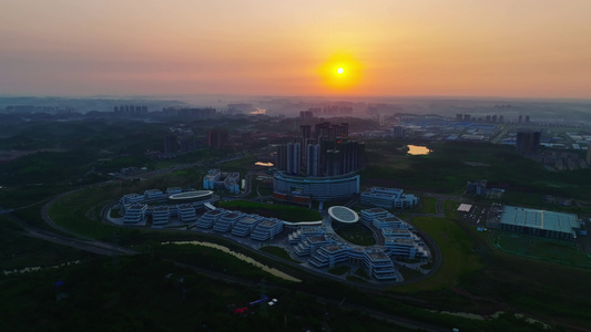 航拍清晨城市建筑日出视频