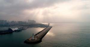 4K航拍被晨雾笼罩的青岛奥帆中心30秒视频