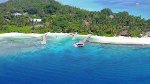 透明泻湖和白沙背景下放松海景海滩之旅的无人机景观之旅12秒视频