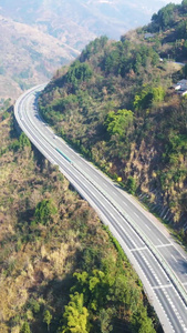 航拍中国西部山区高速公路汽车行驶往来行驶视频