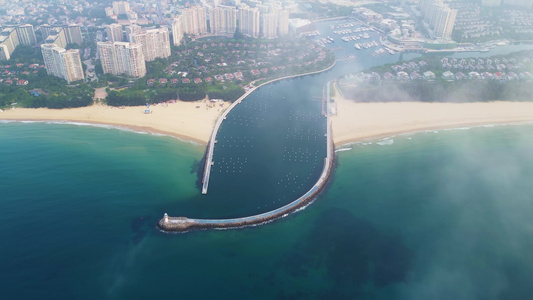 海南陵水黎族自治县清水湾自由灯塔高视角航拍城市游艇基地自贸港视频