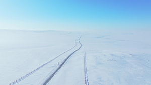 4k航拍呼伦贝尔冬季冰雪草原公路风景15秒视频