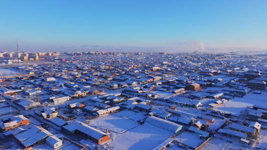 4k航拍内蒙古额尔古纳城市冬季冰雪覆盖风光视频