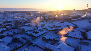 4k航拍内蒙古额尔古纳城市冬季日落14秒视频