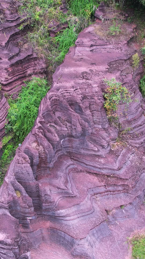 航拍湖南旅游4A级景区湘西红石林国家地质公园红色岩石素材4A景区63秒视频