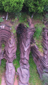 航拍湖南旅游4A级景区湘西红石林国家地质公园红色岩石素材旅游素材视频
