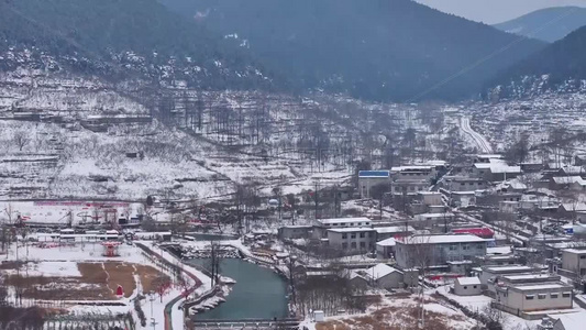 航拍雪后山区乡村宛如水墨画视频