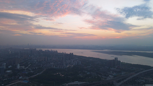 航拍城市风光少见的夕阳晚霞落日火烧云天空江景城市素材视频