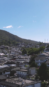 航拍云南丽江古城道路民居景区宣传旅游素材城市宣传视频