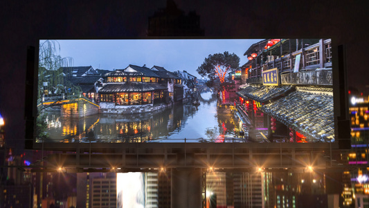 城市建筑群中震撼大气的大屏幕内容图文展示灯光片头AE模板视频