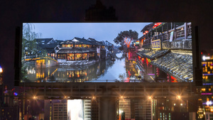 城市建筑群中震撼大气的大屏幕内容图文展示灯光片头AE模板22秒视频