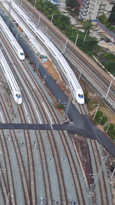 航拍城市交通轨道车站排列整齐万剑齐发的高铁动车列车素材风光城市视频