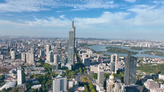 航拍蓝天白云下的南京地标紫峰大厦视频