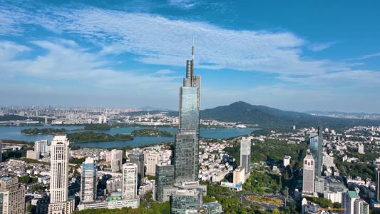 航拍蓝天白云下的南京地标紫峰大厦视频